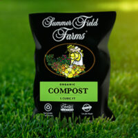 SummerField Farms Organic Compost SummerField Farms organic compost bag displayed on healthy green grass for soil improvement and planting.